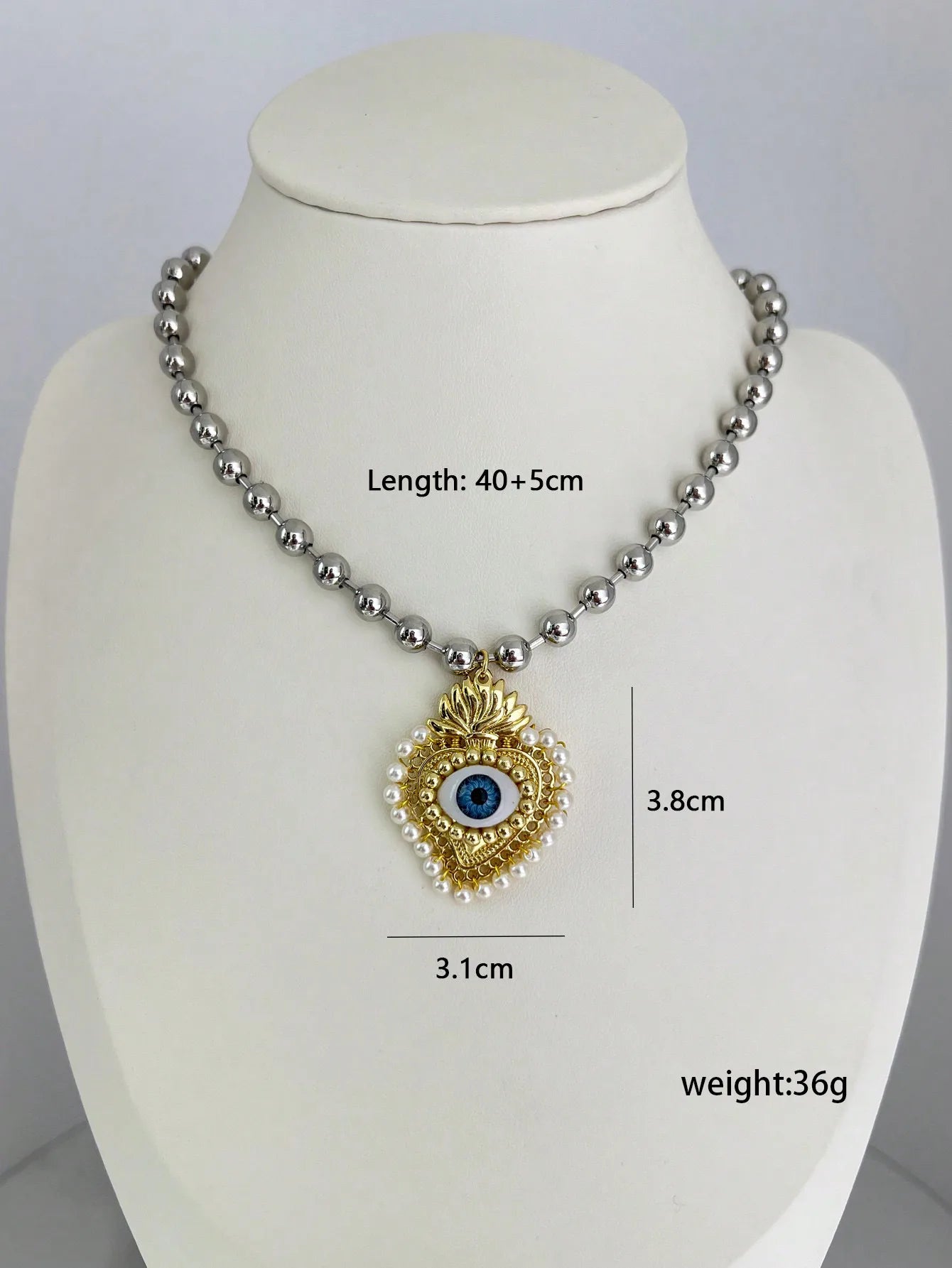 Collar Bolas Corazón Ojo Chapados en oro