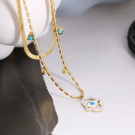 Collar Doble Mano Ojo Dorado