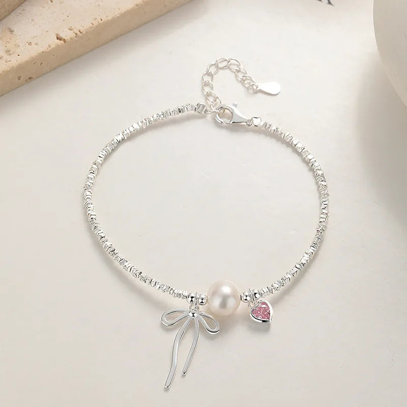 Pulsera Moño Corazón Plata Esterlina