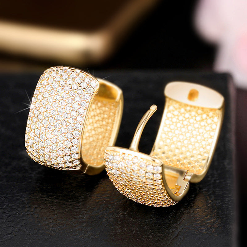 Aretes Dorados Circón Cobre