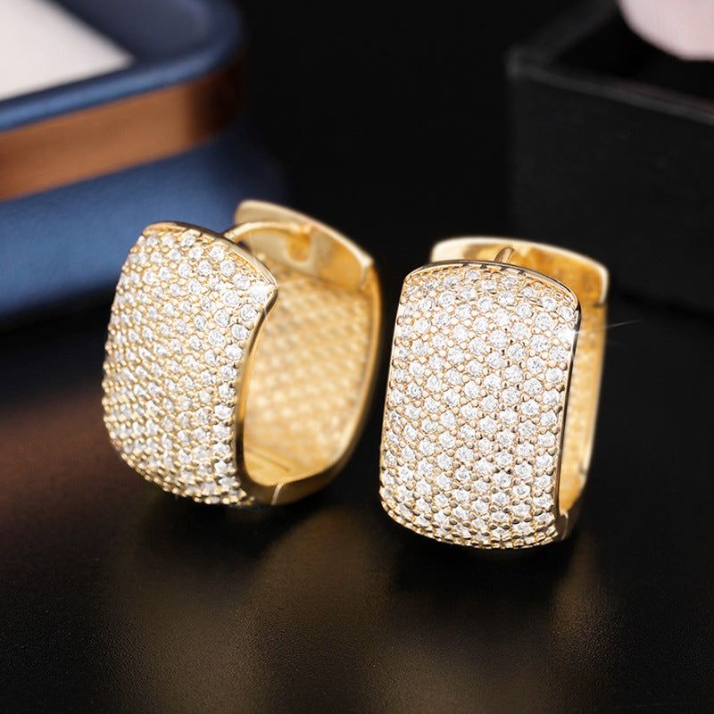 Aretes Dorados Circón Cobre