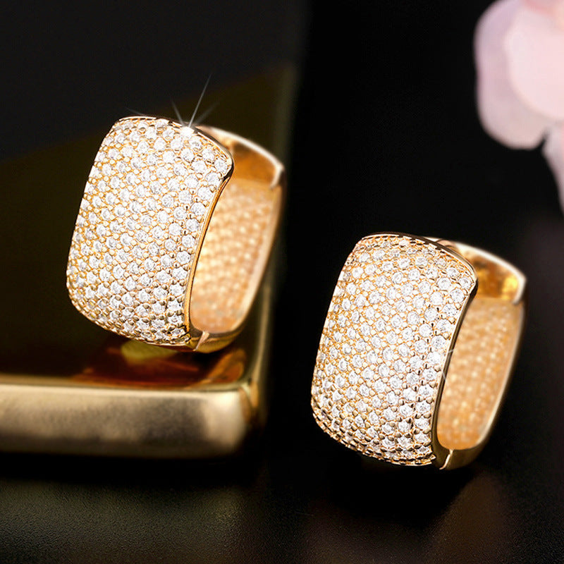 Aretes Dorados Circón Cobre