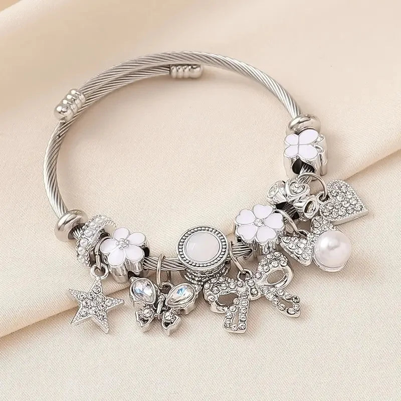 Pulsera Abierta Moño Estrella Acero Inoxidable