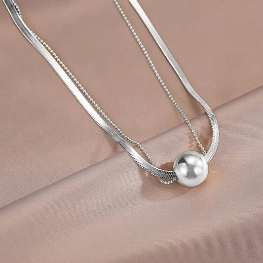 Collar Retro Bola Acero Titanio