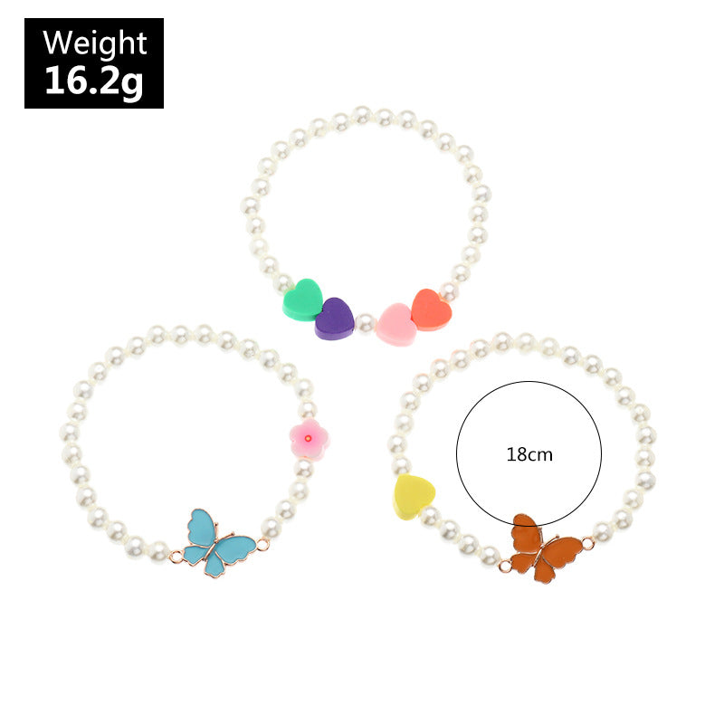 Set 3 Pulseras Perlas Mariposa Corazón