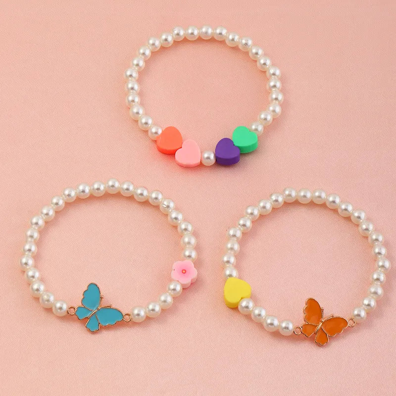 Set 3 Pulseras Perlas Mariposa Corazón