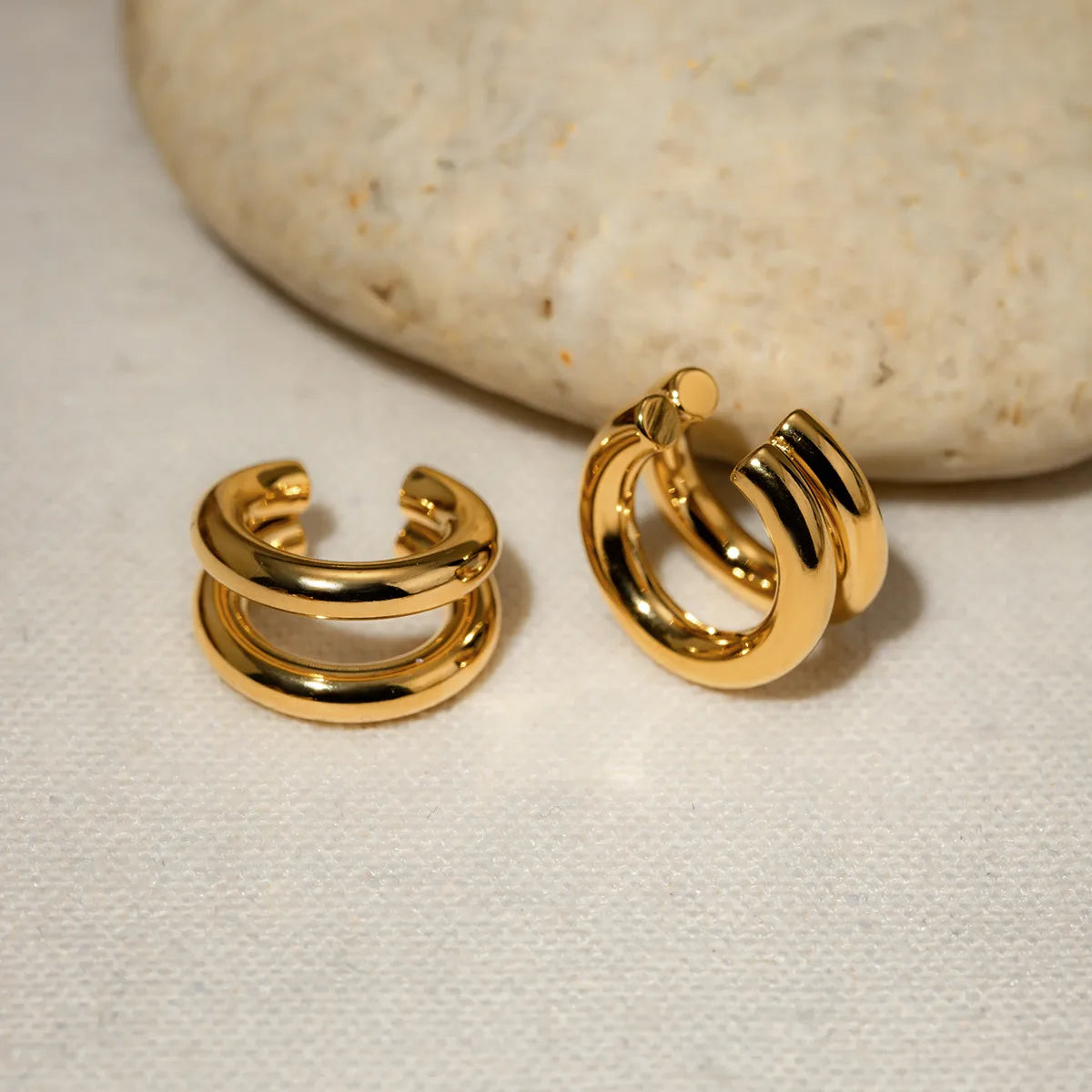 Puños De Oreja Acero Inoxidable