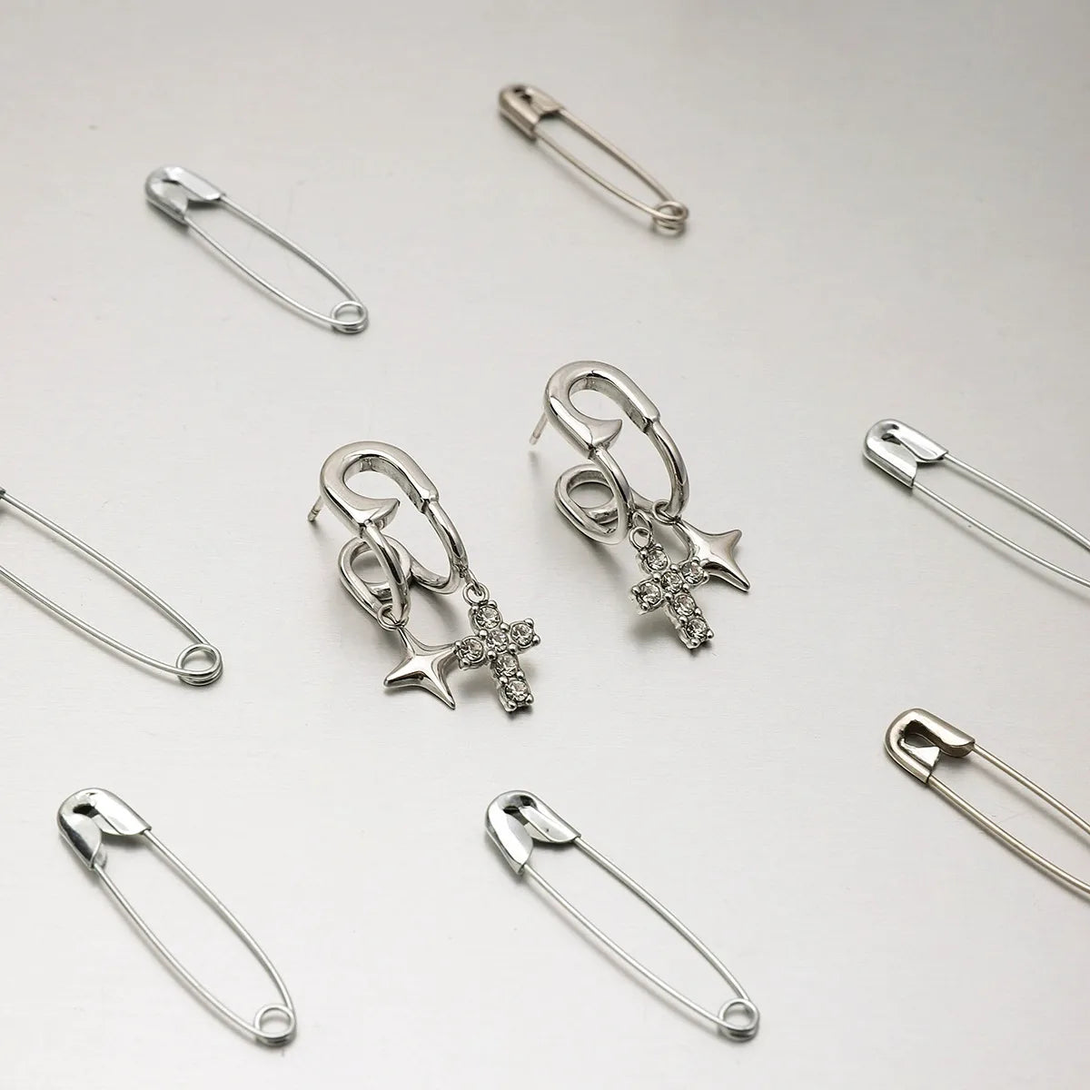 Aretes Segurito Cruz Acero Inoxidable