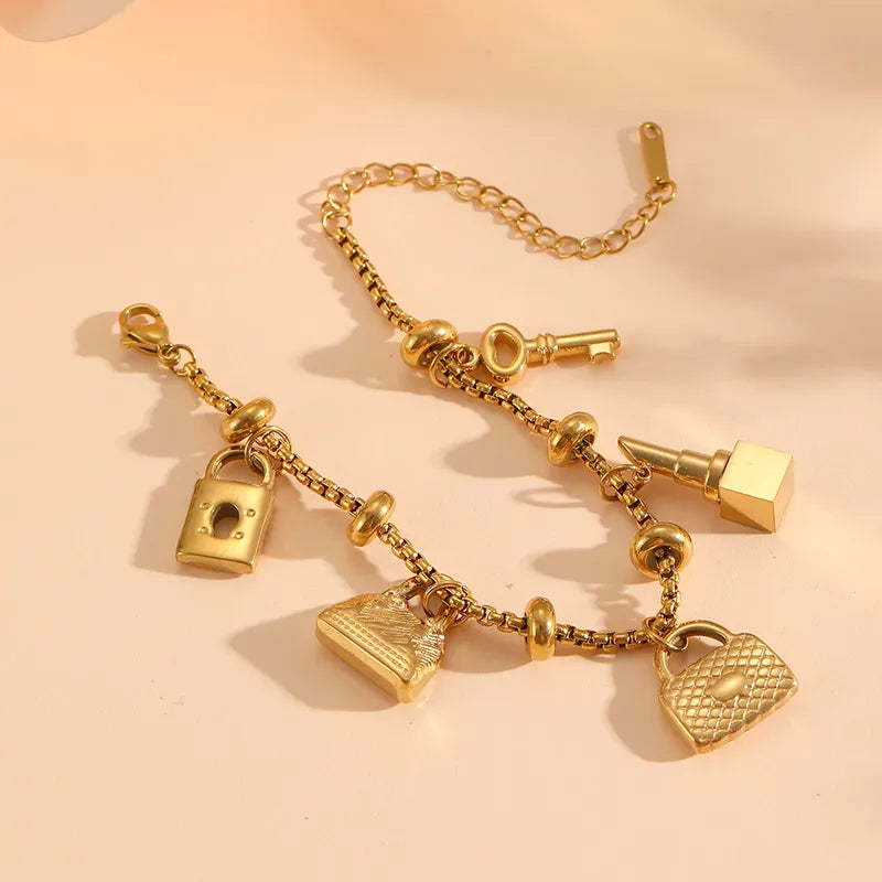 Pulsera Candado Llave Bolso Labial Acero