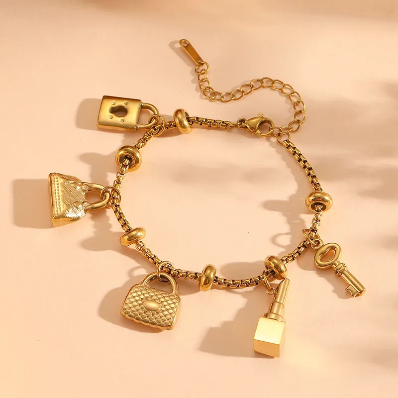 Pulsera Candado Llave Bolso Labial Acero