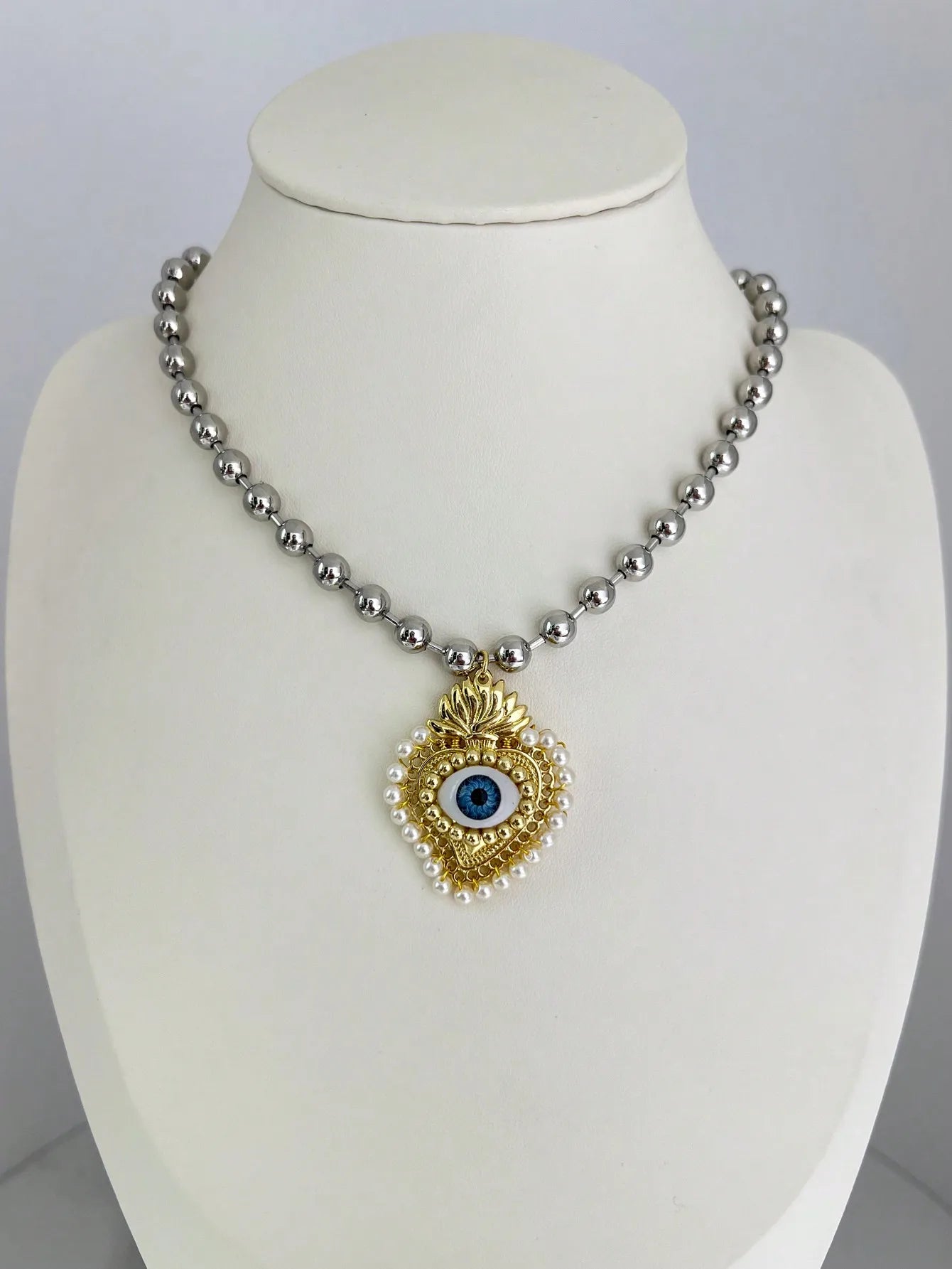 Collar Bolas Corazón Ojo Chapados en oro