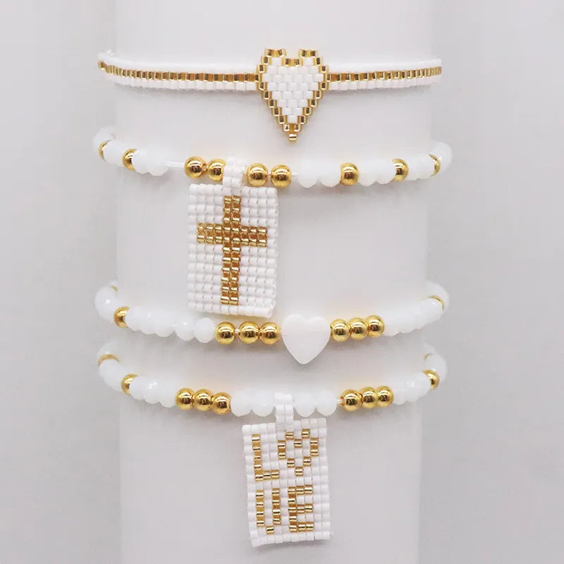 Pulsera Tejida  Cruz Corazón Love