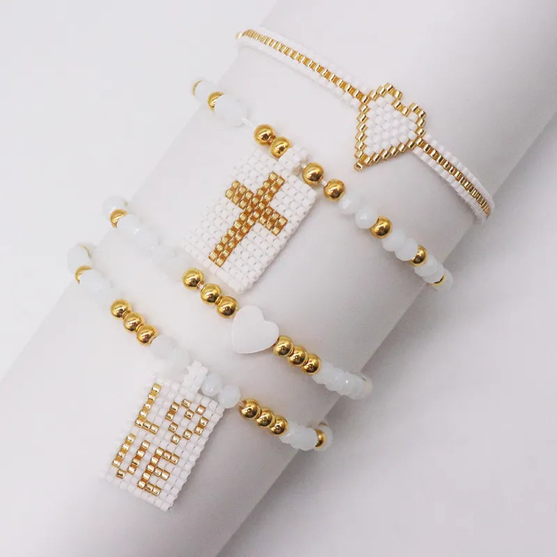 Pulsera Tejida  Cruz Corazón Love