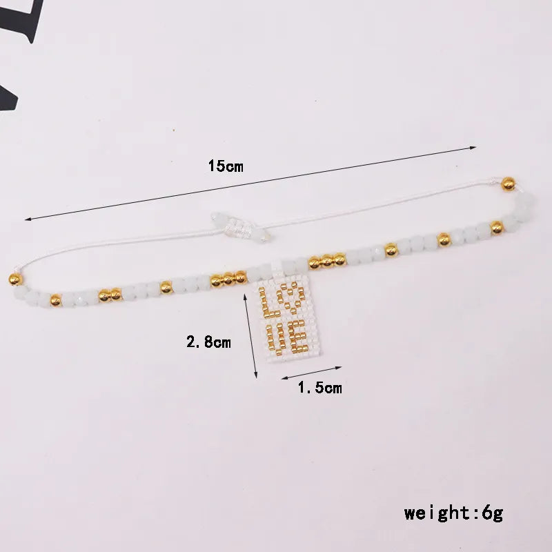 Pulsera Tejida  Cruz Corazón Love