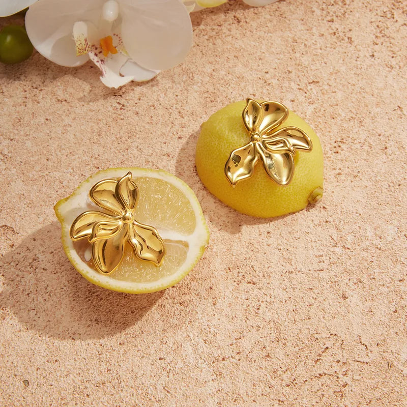Aretes Media Flor Acero Inoxidable
