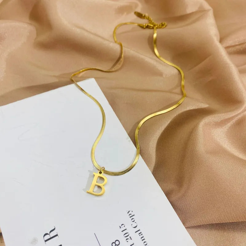 Collar Letra Acero Titanio