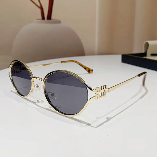 Gafas Negro Marco Ovalado Dorado