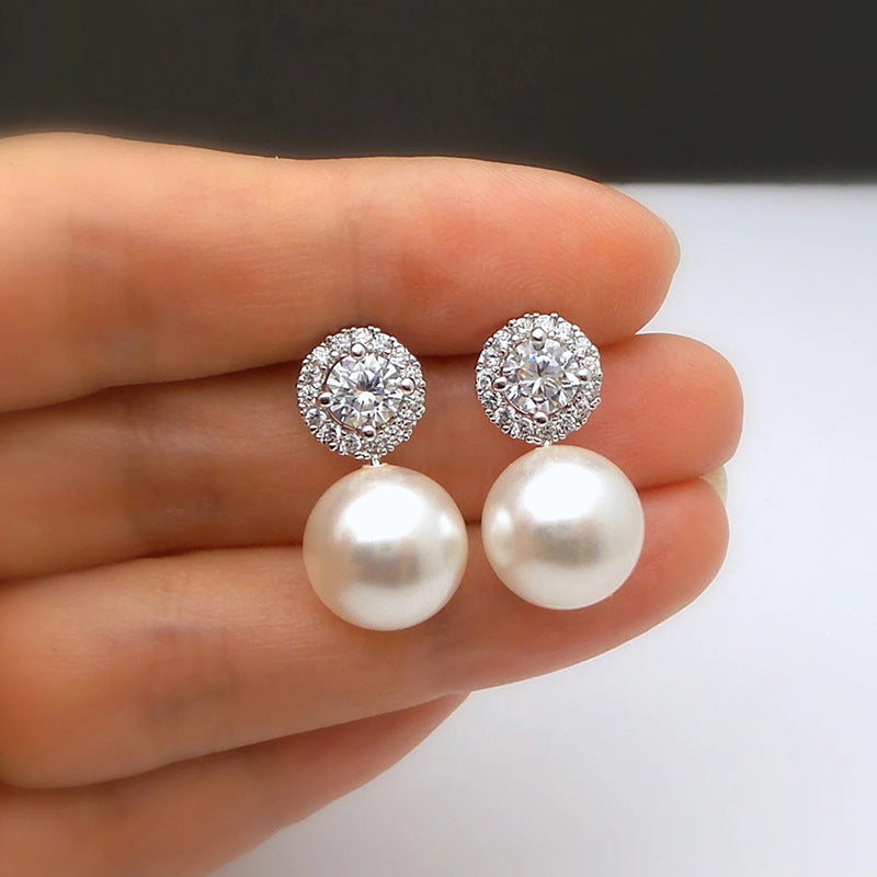 Aretes Perla Circón Cobre