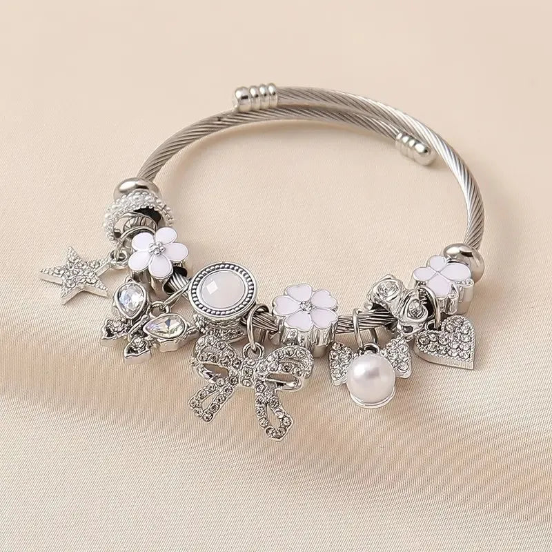 Pulsera Abierta Moño Estrella Acero Inoxidable