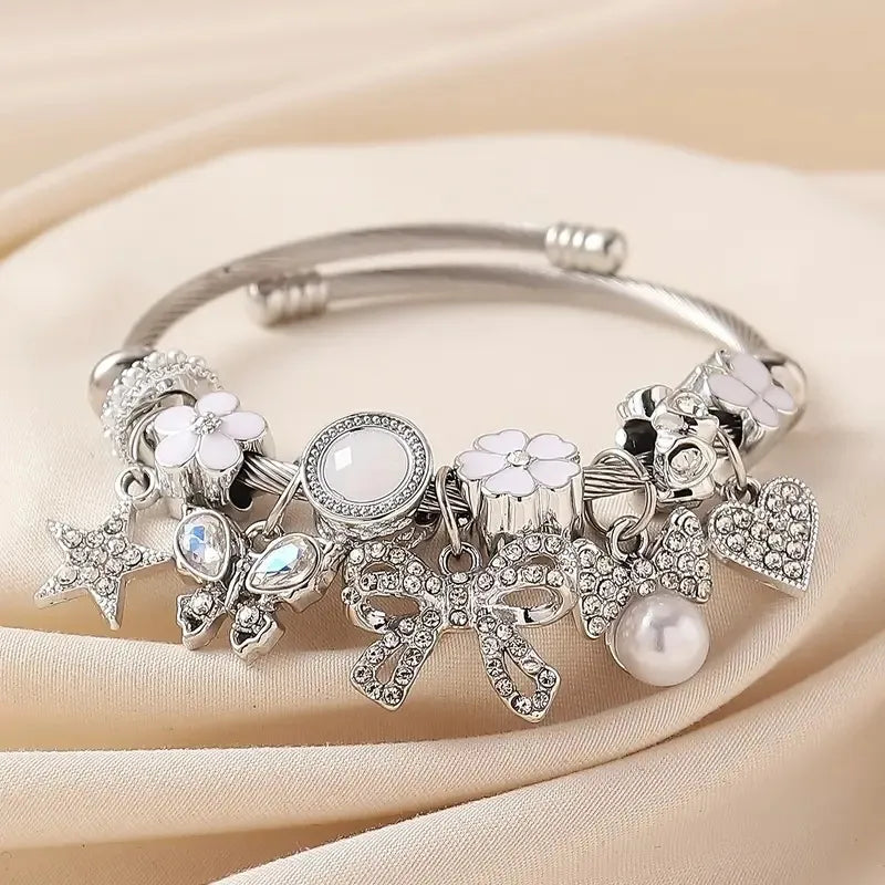 Pulsera Abierta Moño Estrella Acero Inoxidable