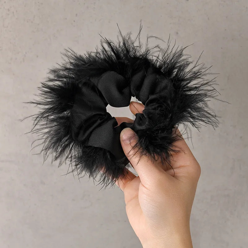 Liga para el cabello plumas
