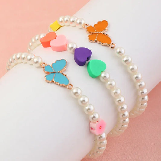 Set 3 Pulseras Perlas Mariposa Corazón